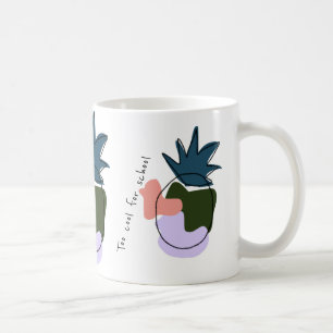 Mug with pineapple graphics and script text