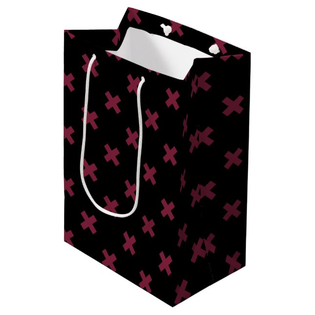 Mulberry cross stitches on black medium gift bag (Front Angled)