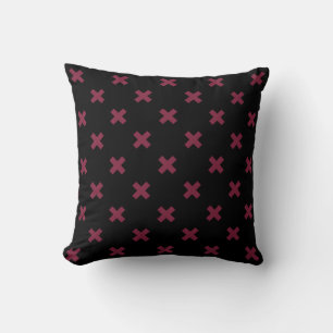 Mulberry cross stitches on black throw pillow