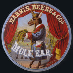 Mule Ear Tobacco Label 6 Inch Round Button<br><div class="desc">Tobacco label showing full-length portrait of a mule standing on hind legs,  wearing robe and glasses,  and carrying tobacco leaves.  Harris,  Beebe & Cos.,   created by The Hatch Lithography Co.,  1868</div>