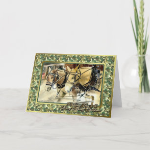 Mules dans la carte de Noël de blanc de harnais