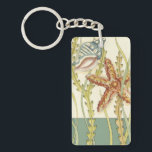 Multi-Colour Shell Party Keychain<br><div class="desc">Charikilia Zarris is a talented artist know for her ocean artwork. Her images are peaceful and calm relaxing you with every picture. Get this nautical piece of artwork with a starfish and a Conch shell being the centre of it all, bordered with beautiful kelp. This image will look great on...</div>