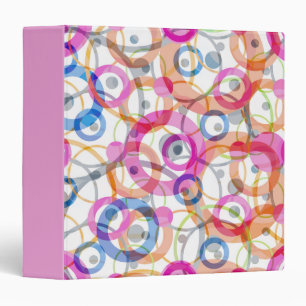 Multi-coloured polka dots, circles on a white binder