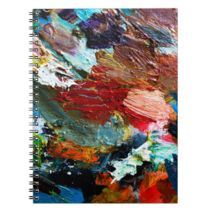 multi-coloured strokes of oil paint on the artist' notebook