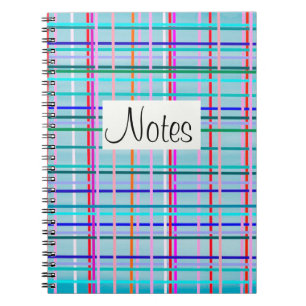 Multicolor check stripes pattern on blue notebook