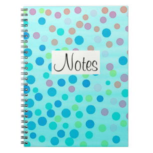Multicolor dots on light blue notebook