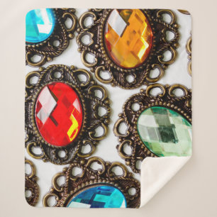 Multicolor vintage brooches on white backgroundbro sherpa blanket