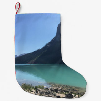 MULTICOLORED CANOES MOORED IN DOCK IN LAKE SMALL CHRISTMAS STOCKING