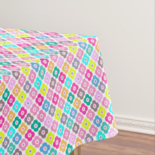 Multicolored rustic flower pattern on white tablecloth