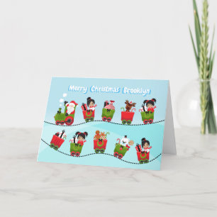 Multicultural Girl Riding Train with Santa Holiday Card