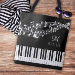 Music Notes Keyboard Name Monogram Custom Colour Tote Bag<br><div class="desc">Personalized, custom colour tote bag featuring a piano keyboard and music staff with notes in your choice of graphics and background colours (shown in white on black) with a monogram or initials and/or name or other text in your choice of font styles and colours to create your own custom look....</div>