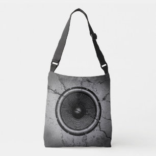 Music speaker on a cracked wall crossbody bag