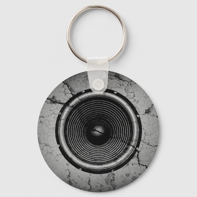 Music speaker on a cracked wall keychain (Front)