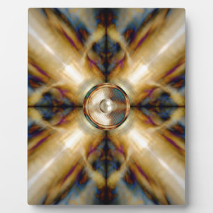Music speaker on a gold cross background plaque