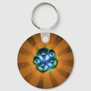 Music speakers and orange sunburst keychain
