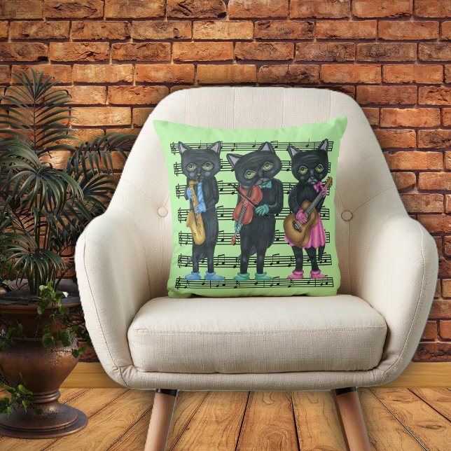 Musical Black Cats Playing Instruments Sheet Music Throw Pillow (Musical Black cats playing instruments colourful clothes sheet music notes on green throw pillow.)