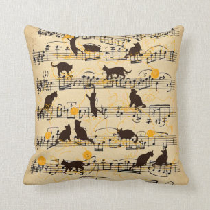 Musical notes and kittens throw pillow
