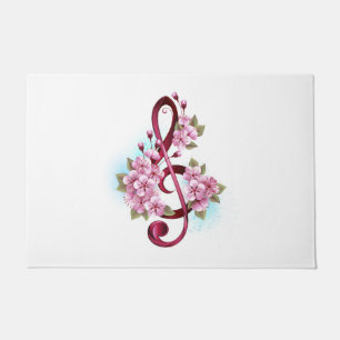 Musical treble clef notes with Sakura flowers Doormat