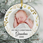My First Christmas As Grandma Photo Gold Foliage Ceramic Ornament<br><div class="desc">This elegant Grandma Christmas Ornament is decorated with gold foliage on a white background.
Easily customizable with baby's photo and year.
Original Watercolor © Michele Davies.</div>
