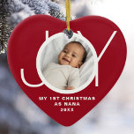 My First Christmas As Nana Photo Red Ceramic Ornament<br><div class="desc">This stylish heart-shaped First Christmas As Nana Photo Ornament is decorated with the word JOY on a red background.
Easily customizable with your photo,  name,  and year.</div>