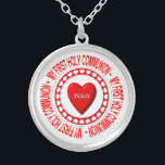 My First Holy Communion Necklace<br><div class="desc">This necklace features a Host surrounded by heats and bearing a "3-D" look heart in the middle with the name of Jesus on it. Surrounding all this are the words "My First Holy Communion".</div>