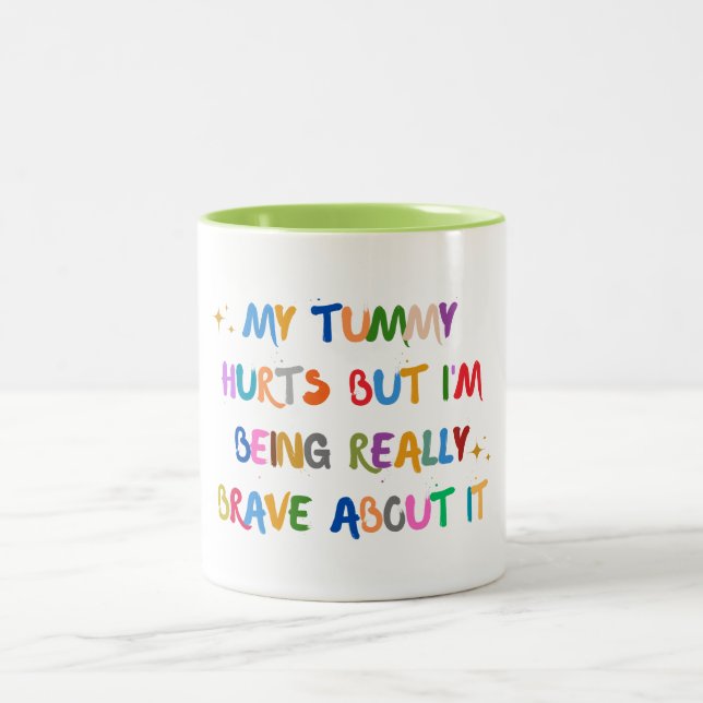 My tummy Hurts But I'm Really Brave about it Two-Tone Coffee Mug (Center)