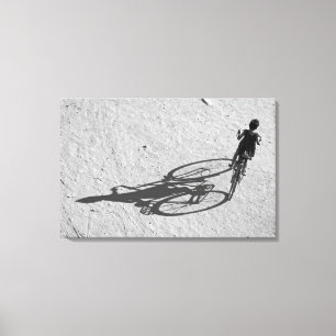 Myamar, Bagan, Young boy riding a huge bike and Canvas Print