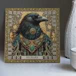 Mystical Raven Spirit Personalized Tribal Tile<br><div class="desc">Embark on a mystical journey with our "Mystical Raven Spirit" ceramic tile. The design features a majestic Raven, resplendent with tribal jewels, captured in perfect symmetrical harmony. The colours are rich and comforting, with shades of dark green, brown, gold, and dark aquamarine, and they create a feeling reminiscent of an...</div>