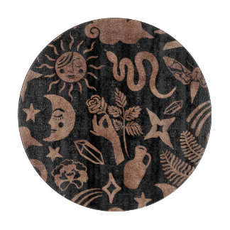 Mystical symbols: snake, sun, moon. cutting board