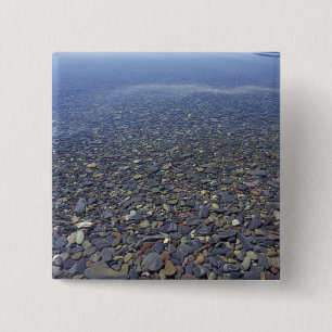 NA, USA, Montana, Glacier NP Rocks in Lake 2 Inch Square Button
