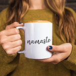 Namaste | Modern Spiritual Meditation Yoga Two-Tone Coffee Mug<br><div class="desc">Simple, stylish "namaste" quote art design in modern minimalist handwritten script typography. The slogan can easily be personalized with your own words for a perfect gift for a yoga bunny or pilates lover! Namasté literally means "greetings to you." In the Vedas, namaste mostly occurs as a salutation to a divinity....</div>