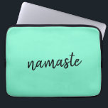Namaste | Neo Mint Green Modern Yoga Spiritual Laptop Sleeve<br><div class="desc">Simple, stylish "namaste" quote art design in modern minimalist handwritten script typography on a mint green background. The slogan can easily be personalized with your own words for a perfect gift for a yoga bunny or pilates lover! Namasté literally means "greetings to you." In the Vedas, namaste mostly occurs as...</div>
