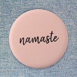 Namaste | Peachy Pink Modern Yoga Meditation 2 Inch Round Button<br><div class="desc">Simple, stylish "namaste" quote art design in modern minimalist handwritten script typography on a pastel peachy pink background. The slogan can easily be personalized with your own words for a perfect gift for a yoga bunny or pilates lover! Namasté literally means "greetings to you." In the Vedas, namaste mostly occurs...</div>