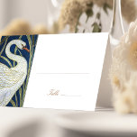 Name Cards Swans Wedding Table Vintage Art Nouveau<br><div class="desc">This wedding table name card is a homage to the Art Nouveau style, graced with the image of a majestic swan set against a dark blue background, accented by flowing gold lines and white lily details. The swan is illustrated with a sense of grace and movement, its feathers detailed in...</div>
