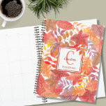Name Monogram Foliage Planner<br><div class="desc">This colourful Planner is decorated with a watercolor leaves pattern in rusts, yellows, and purples. Easily customizable with your name, monogram, and year. Use the Design Tool option to change the text size, style, and colour. Because we create our artwork you won't find this exact image from other designers. Original...</div>