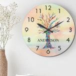 Name Monogram Rainbow Tree Large Clock<br><div class="desc">This colourful Wall Clock is decorated with a mosaic tree in the colours of the rainbow on a watercolor background.
Easily customizable with your name or monogram.
Because we create our own artwork you won't find this exact image from other designers.
Original Mosaic and Watercolor © Michele Davies.</div>