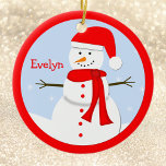 Name Personalized Christmas Snowman Ornament<br><div class="desc">This name personalized Christmas snowman ornament features an adorable little snowman wearing a red Santa hat, red muffler and red buttons on a winter day with snow falling in the background. The snowman scene has a coordinating red border. You may personalize the name ornament with your name or the name...</div>