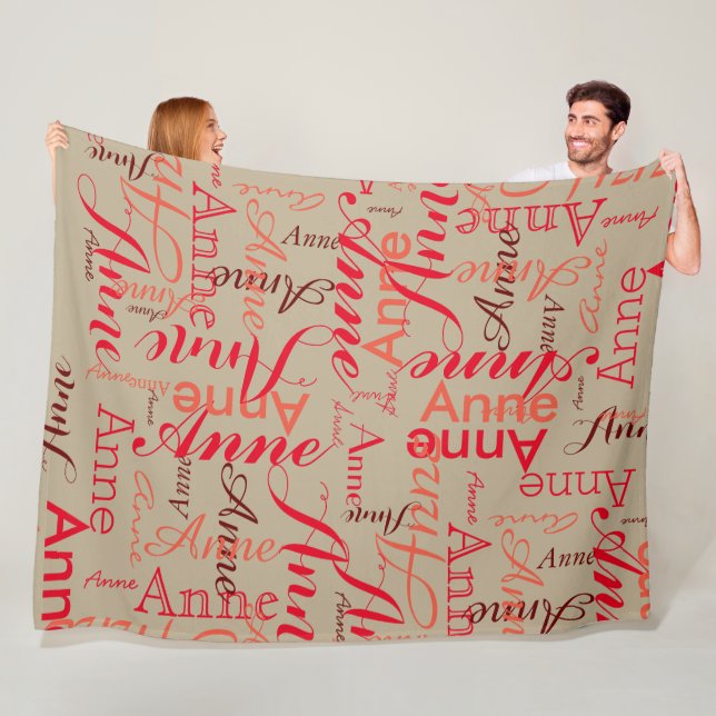 Name Printed in Red all-over a Pale Khaki Fleece Blanket (In Situ)