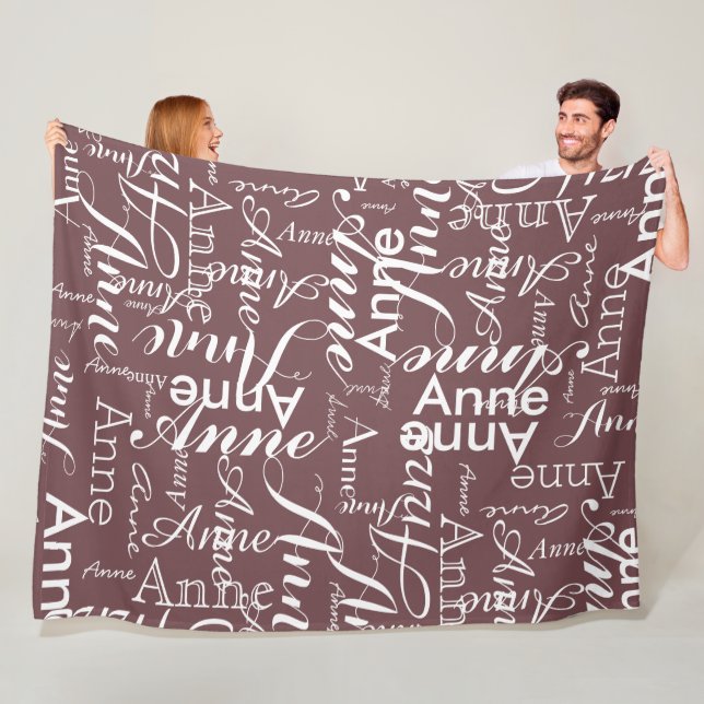 Name Printed in White all-over a Fired-Brick Fleece Blanket (In Situ)