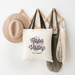Napa Valley California Vintage Logo Tote Bag<br><div class="desc">Cute Napa Valley, California tote bag features the name of the legendary wine producing region in vintage distressed lettering, overlaid on an illustration of a cluster of ripe grapes, ready to be turned into wine. Personalize this cute tote with a name or wedding date for a cool personalized gift or...</div>