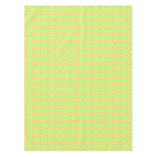 Nappe Ananas jaune tranché sur un chiffon de table vert