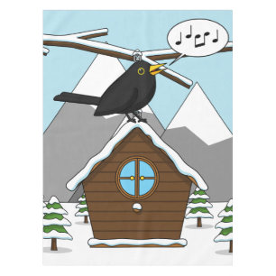 Nappe Happy Blackbird chanter dans le paysage hivernal