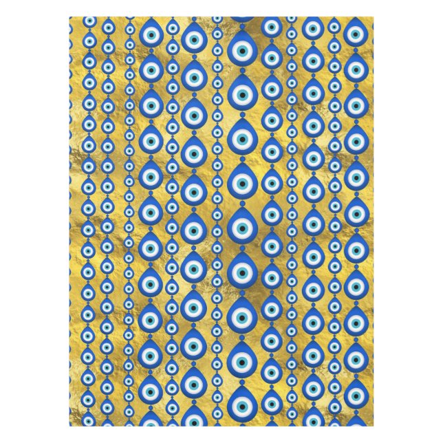 Nappe motif de l'oeil malin sur la texture dorée (Devant)