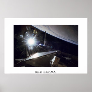 NASA: Shuttle Endeavour sunburst over Earth. Poster