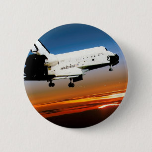 NASA SPACE SHUTTLE FLYING INTO COCOA BEACH 2 INCH ROUND BUTTON