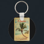 Nassau Palm Tree Vintage Travel Keychain<br><div class="desc">A uniquely retro mid-century modern Nassau Bahamas art print in vintage travel poster style. It features a curved palm tree on sandy beach with ocean under a blue cloudy sky.</div>