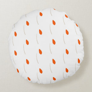 Natural reddish accents round pillow