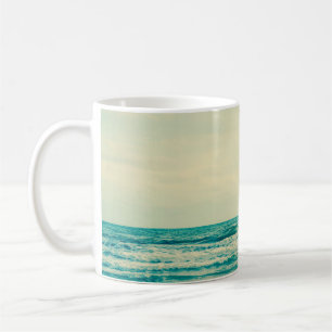 Natural tropical sea and beach with windy wave in coffee mug