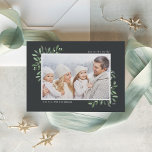 Naturally Joyful | Elegant Watercolor Photo Holiday Card<br><div class="desc">This simple and elegant nature-inspired holiday card features your favorite horizontal or landscape-oriented photo adorned at the corners with sprigs of graceful forest green watercolor foliage. Personalize with your custom greeting (shown with "Joy to the World"), the year, and your family name in modern lettering. An elegant botanical design for...</div>