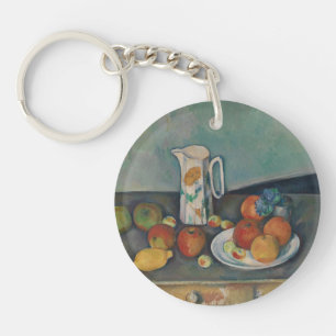 Nature morte, pichet de lait et fruits sur une tab